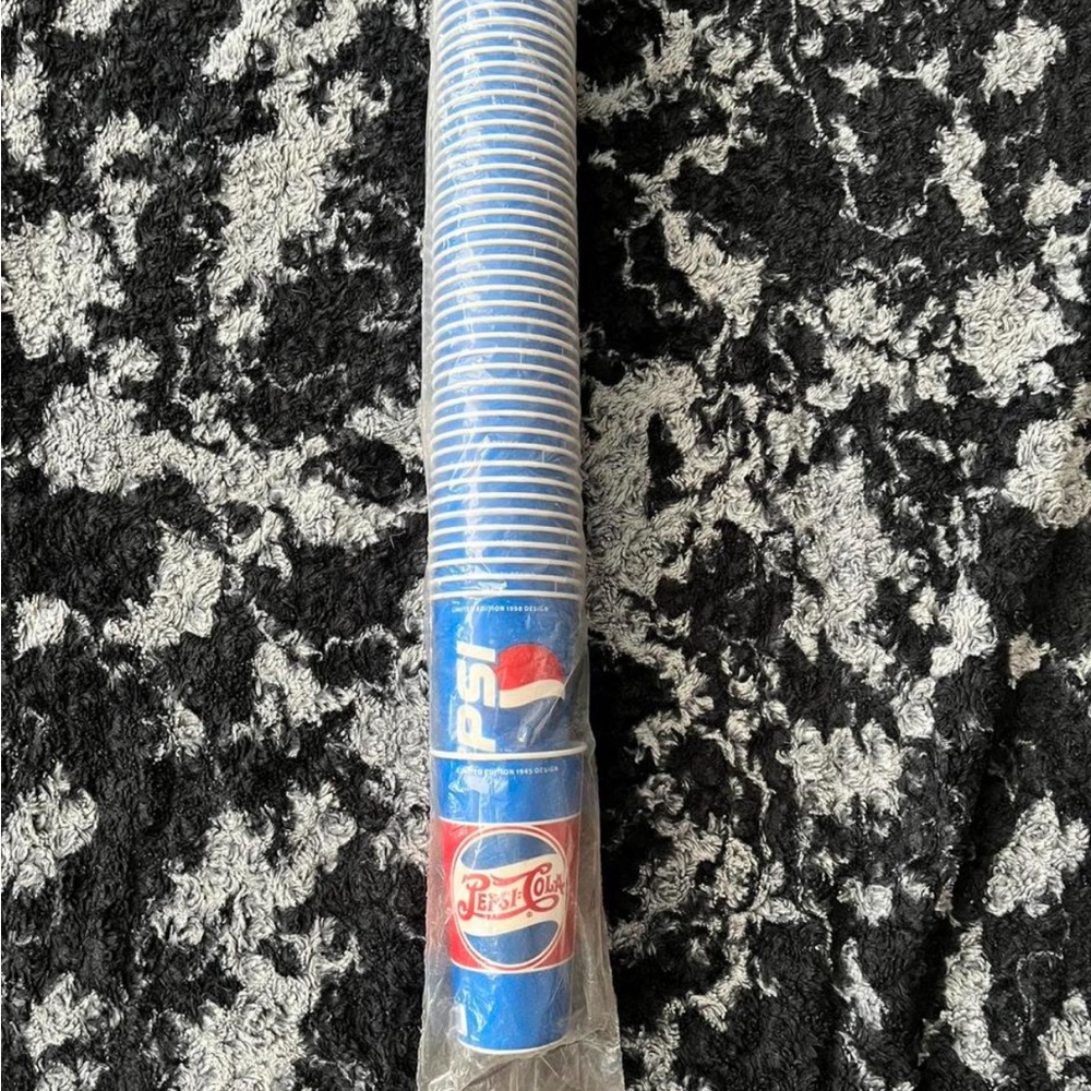 Vintage 1945 & 1998 unopened pepsi paper cups.